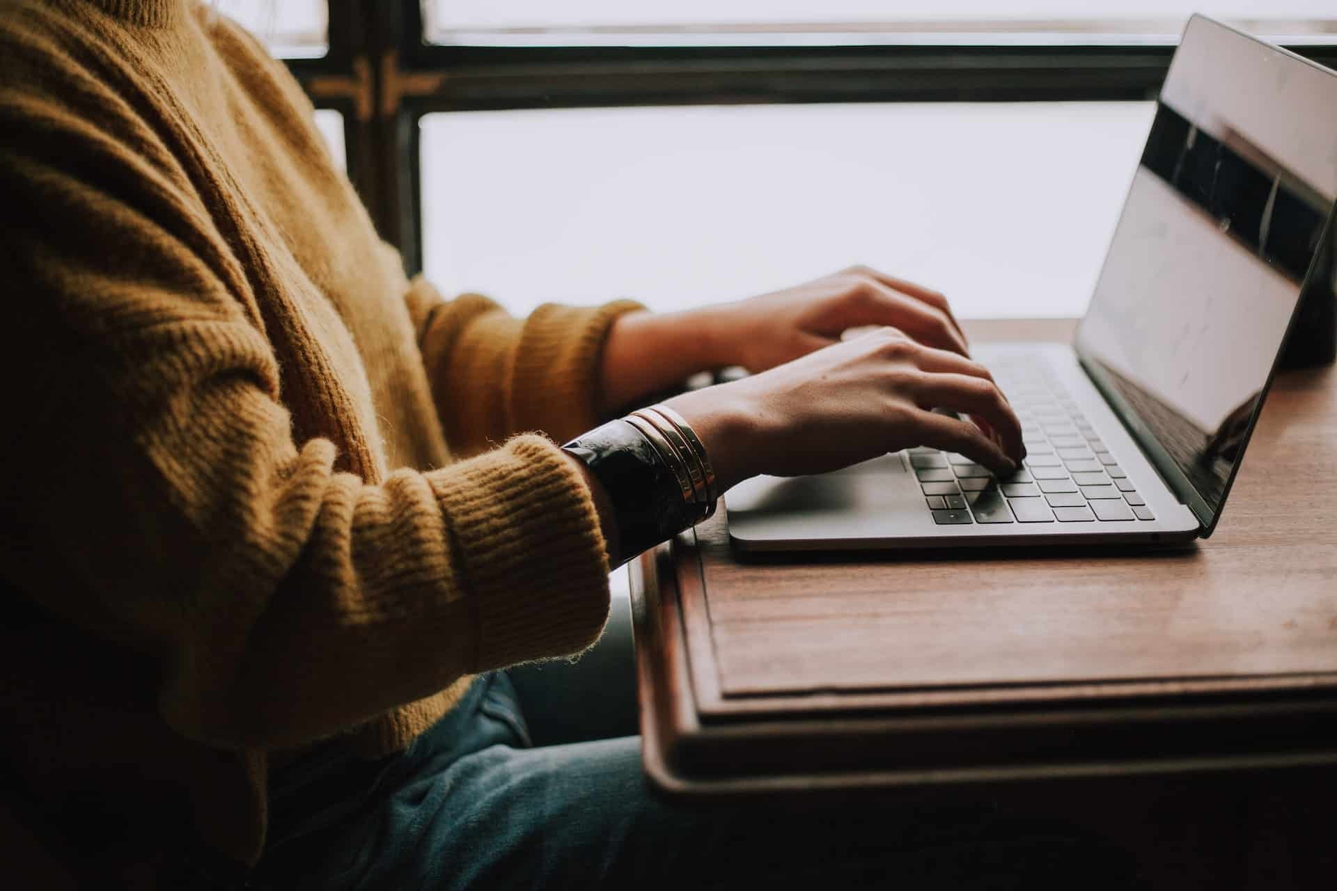 Woman editing on laptop