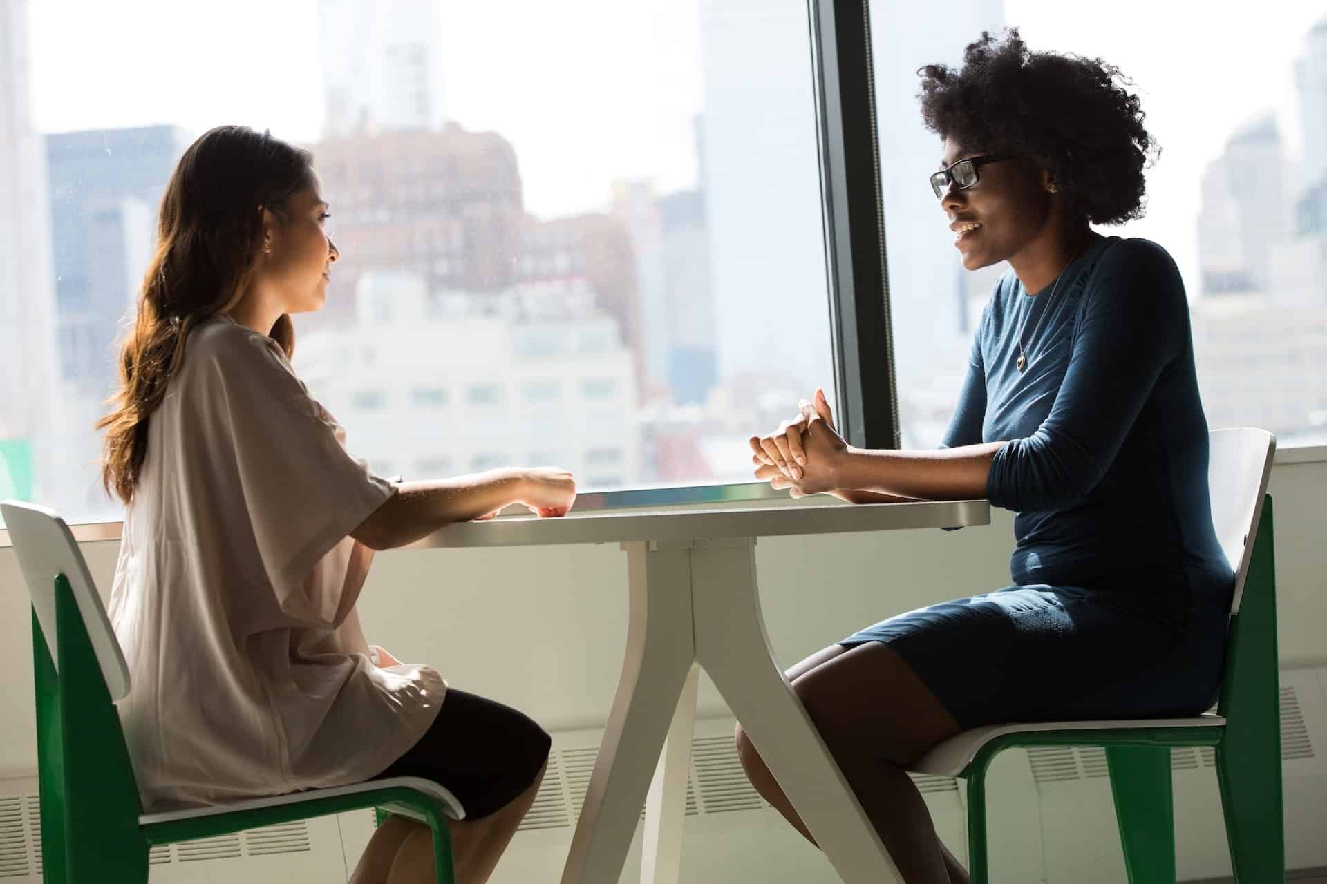 Two women are sitting in the office Low cost high profit business ideas